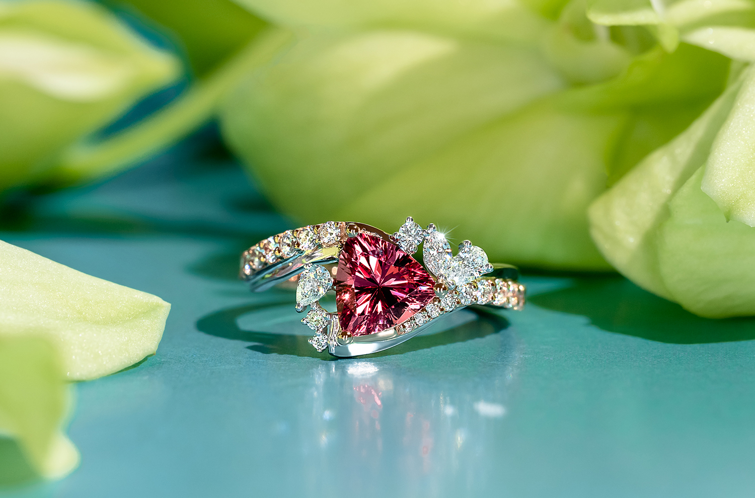 A trillion cut pink Gemstone in one of our Signature MADLY designs, set in 18K gold and Diamonds.