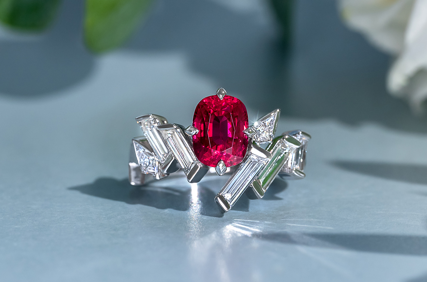 An elegantly edgy Ruby ring accentuated with baguette and custom cut diamonds.