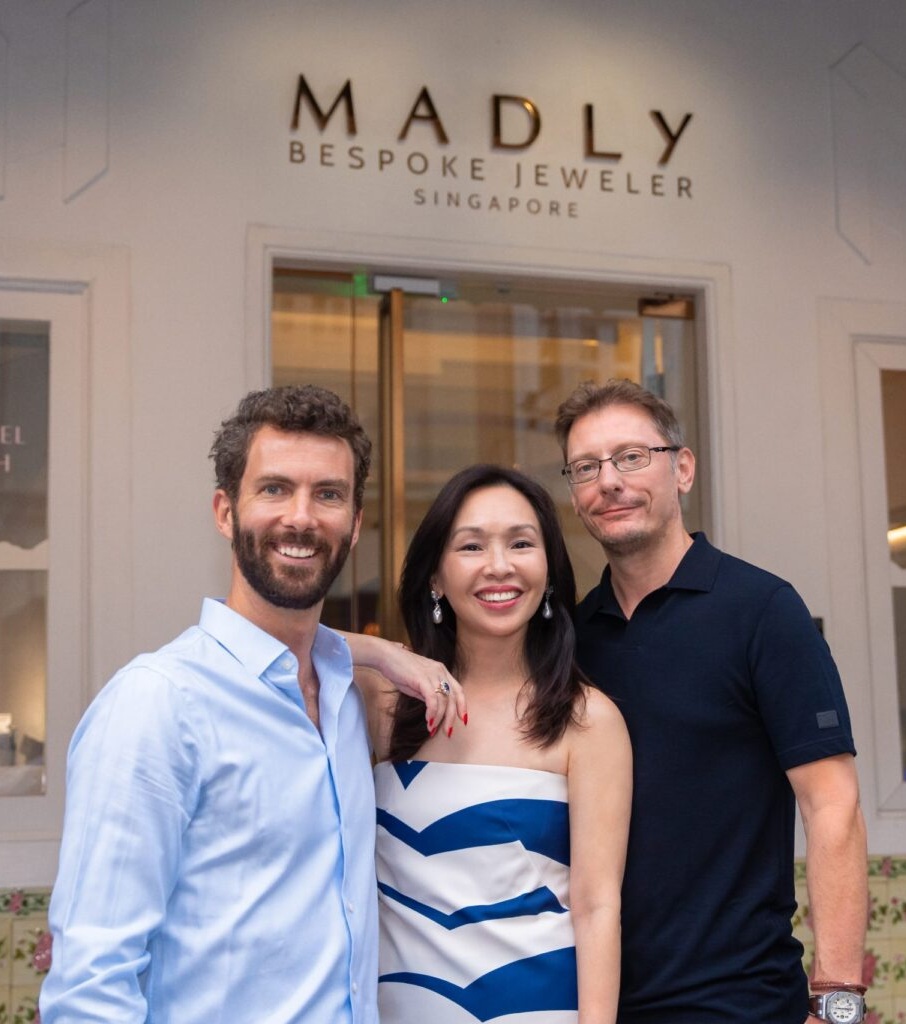 Wez Barber, GIA Graduate Gemologist examining colored gemstones